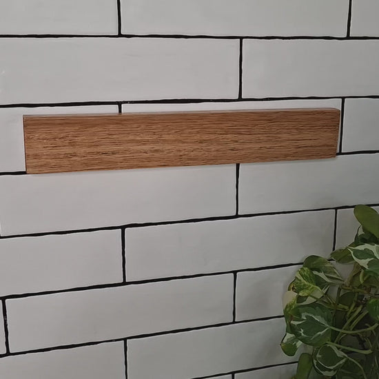 Wall mounted magnetic knife holder